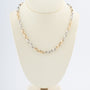 Wit/geelgouden schakel collier