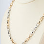 Wit/geelgouden schakel collier