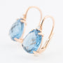 Roségouden oorhangers met briljant en blauw kristal