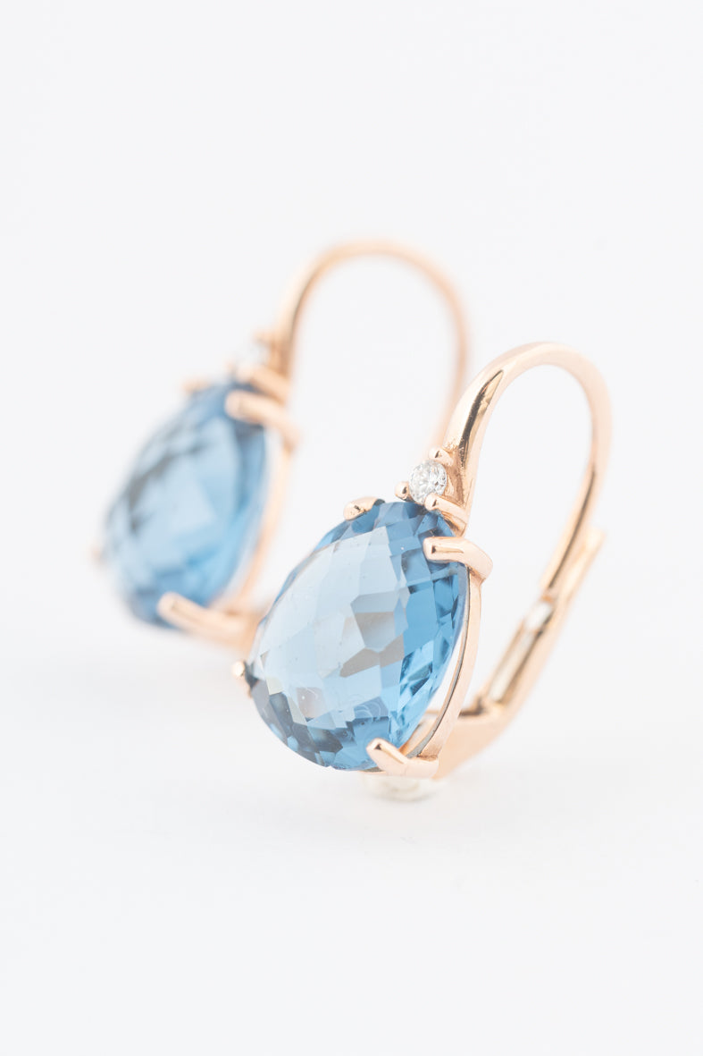 Roségouden oorhangers met briljant en blauw kristal