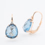 Roségouden oorhangers met briljant en blauw kristal