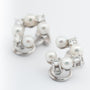 Wit gouden oorclips met briljanten en parels