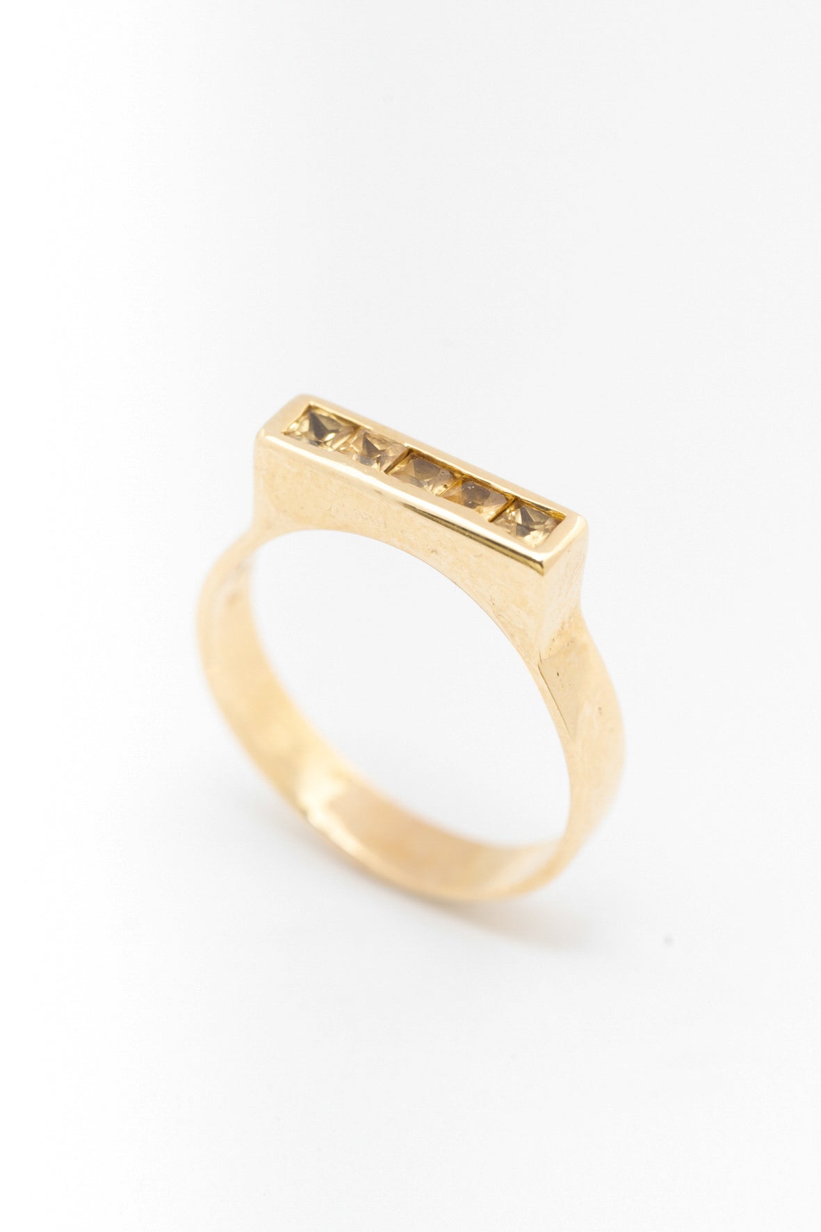 3 geel gouden rij ringen met briljant en topazen