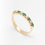 Yellow gold eternity ring with emeralds and brilliant cut diamonds