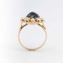 Yellow gold ring with pear-shaped garnet and pearls