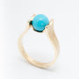 Yellow gold ring with turquoise