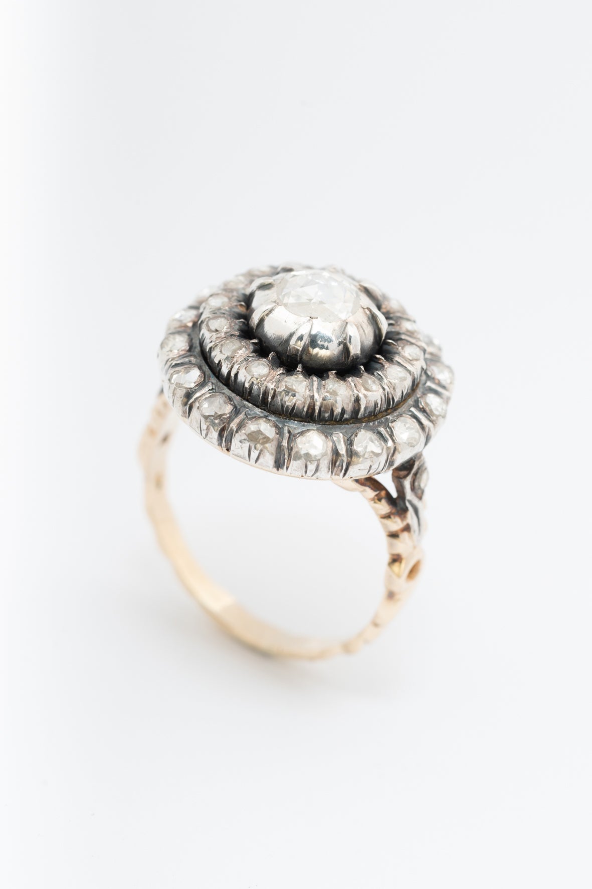 Yellow gold double entourage ring with diamonds