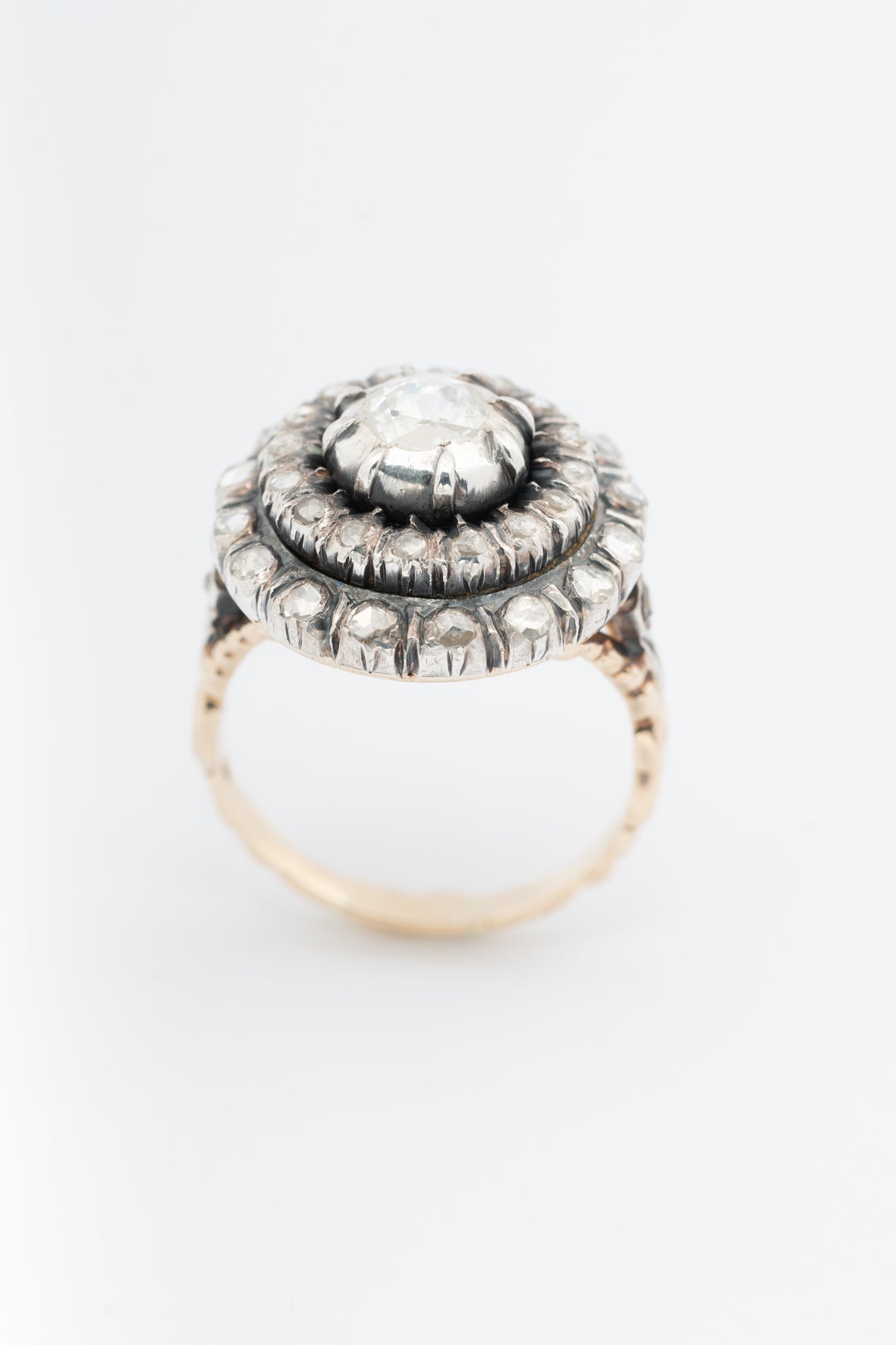 Yellow gold double entourage ring with diamonds