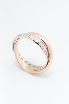 Bi-color gold ring, the white gold part being an eternity ring with diamonds (rose gold white gold)