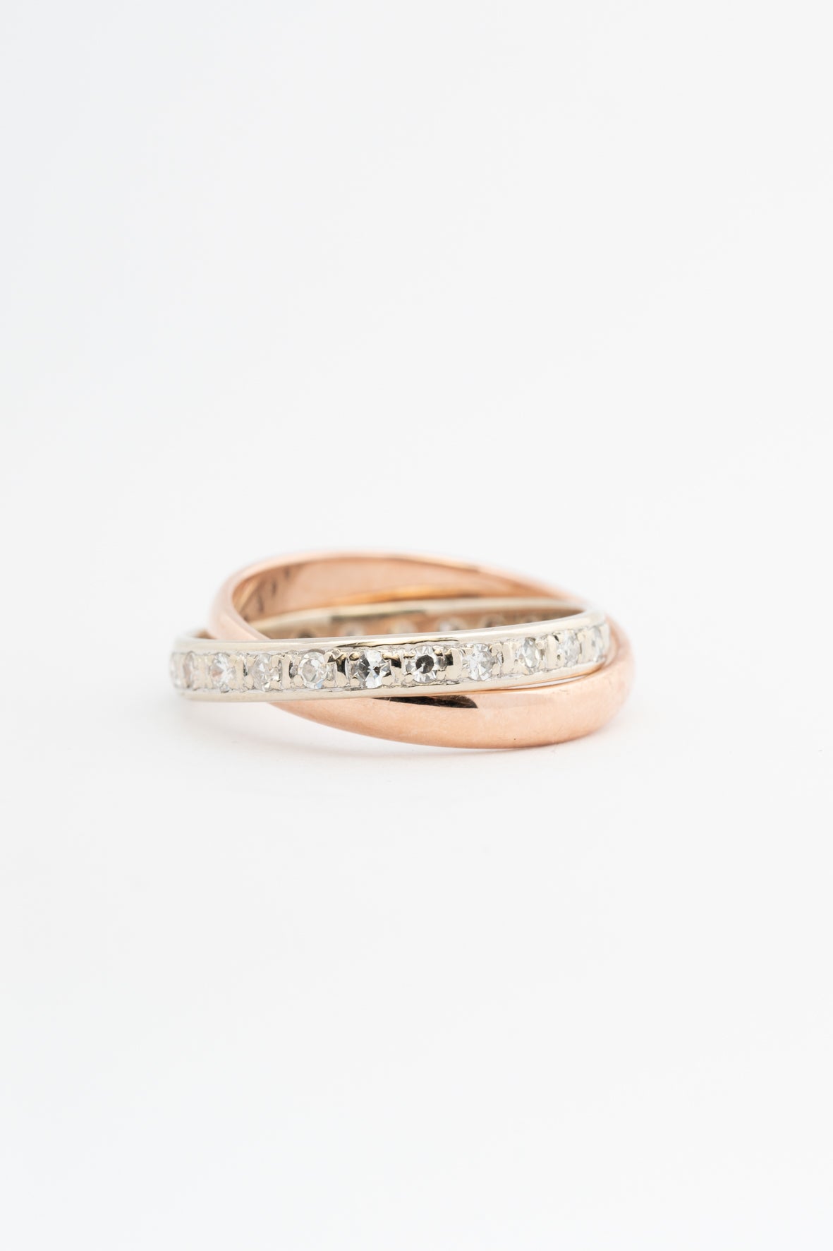 Bi-color gold ring, the white gold part being an eternity ring with diamonds (rose gold white gold)