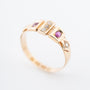 Old yellow gold English ring with rubies and diamonds