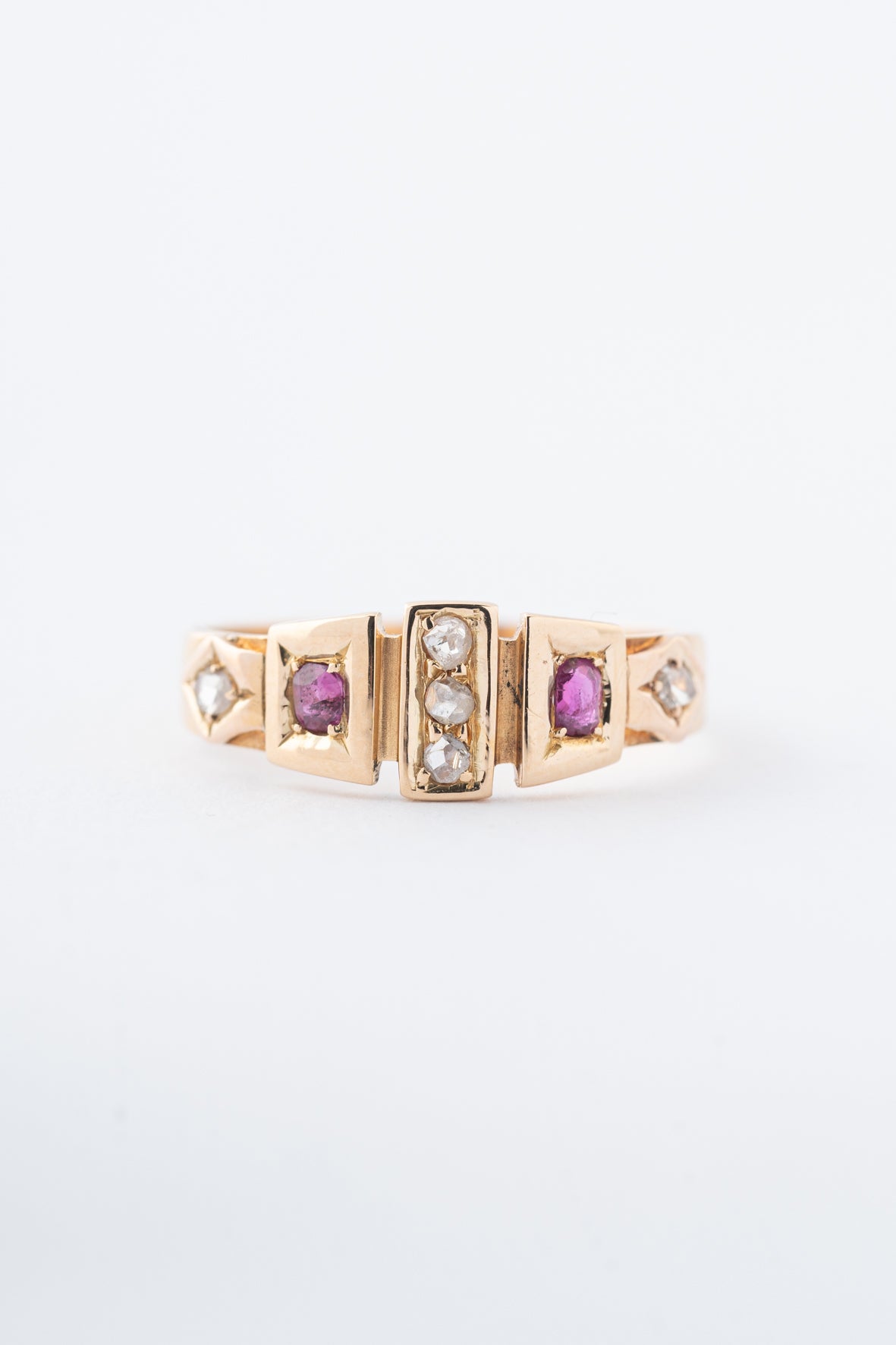 Old yellow gold English ring with rubies and diamonds