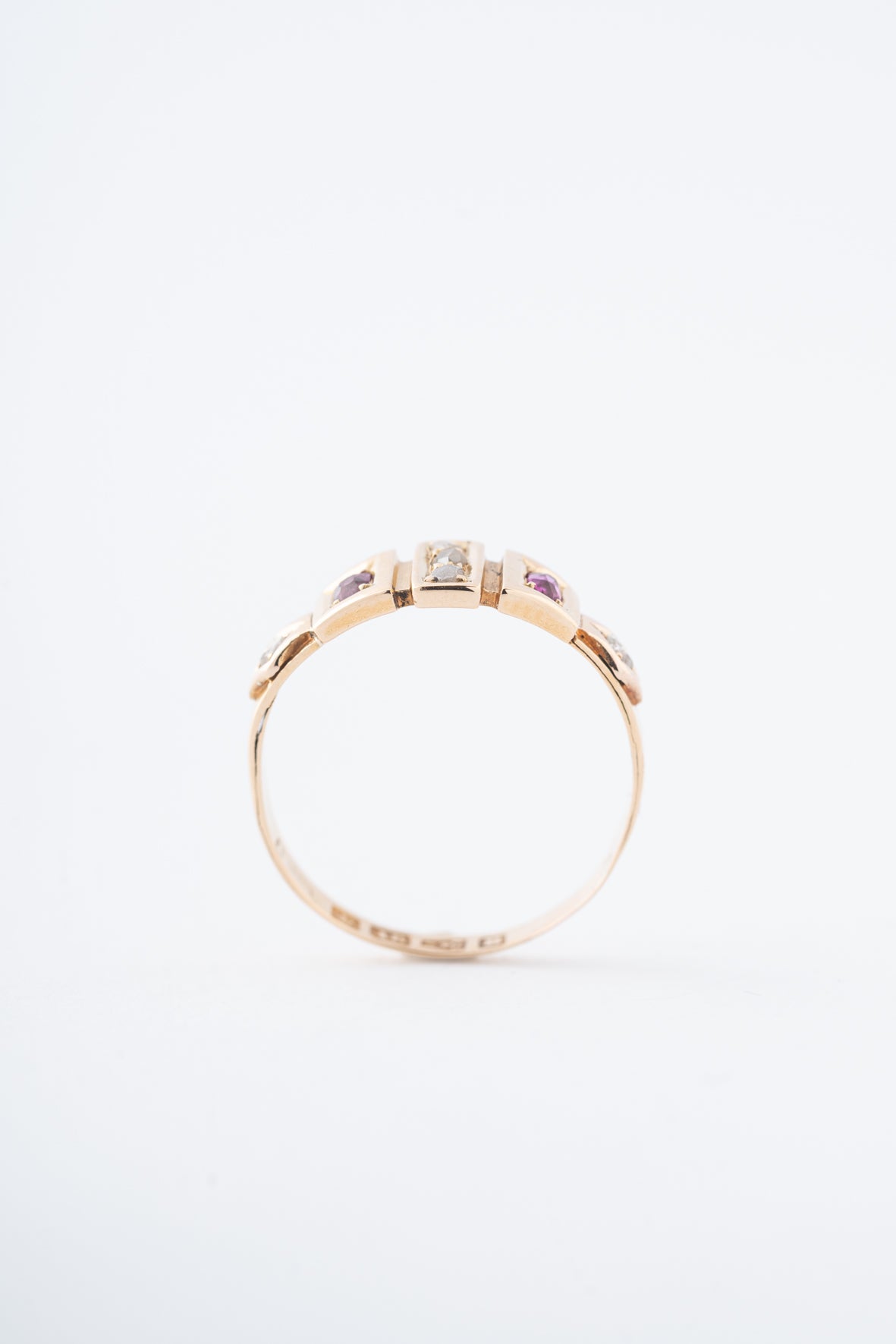 Old yellow gold English ring with rubies and diamonds