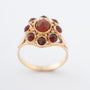 Yellow gold entourage ring with carnelian