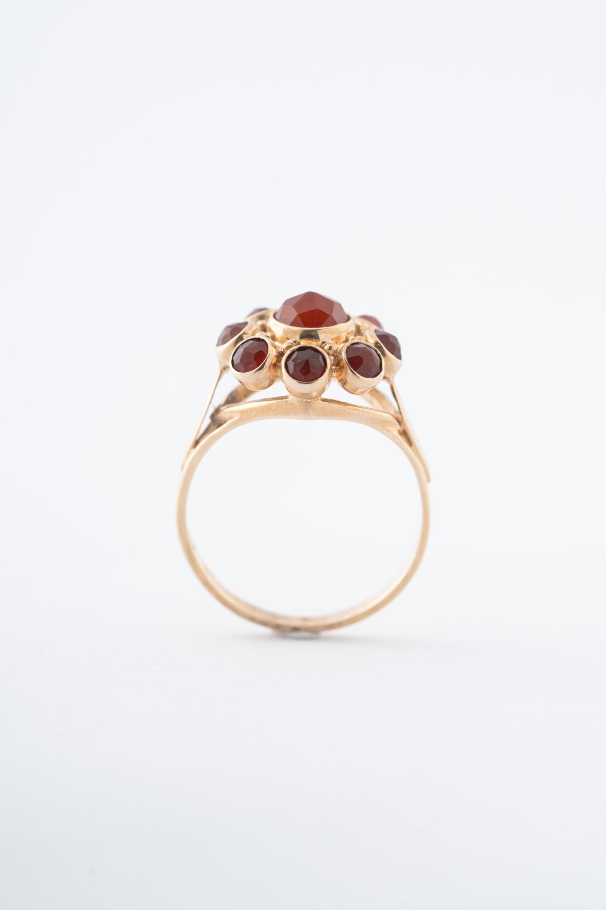 Yellow gold entourage ring with carnelian