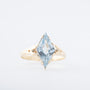 Antique yellow gold marquise ring with a blue spinel