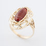 Yellow gold ring with a striped agate
