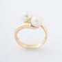 Yellow gold crossover ring with cultured pearls
