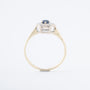 Yellow gold entourage ring with sapphire and brilliant-cut diamonds