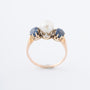 Yellow gold ring with cultured pearl and sapphires