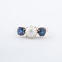 Yellow gold ring with cultured pearl and sapphires