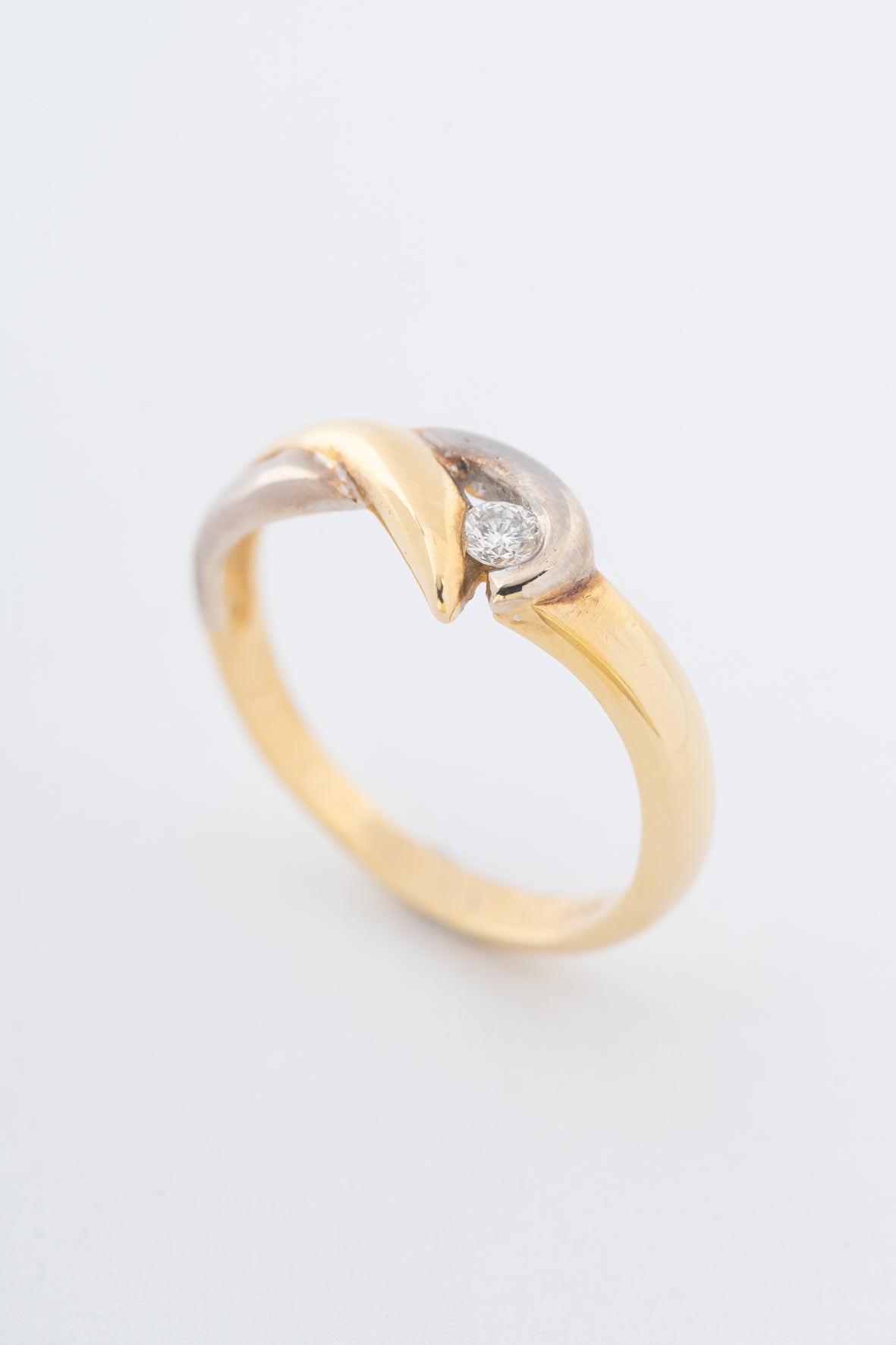 Witgouden/geelgouden ring met een briljant