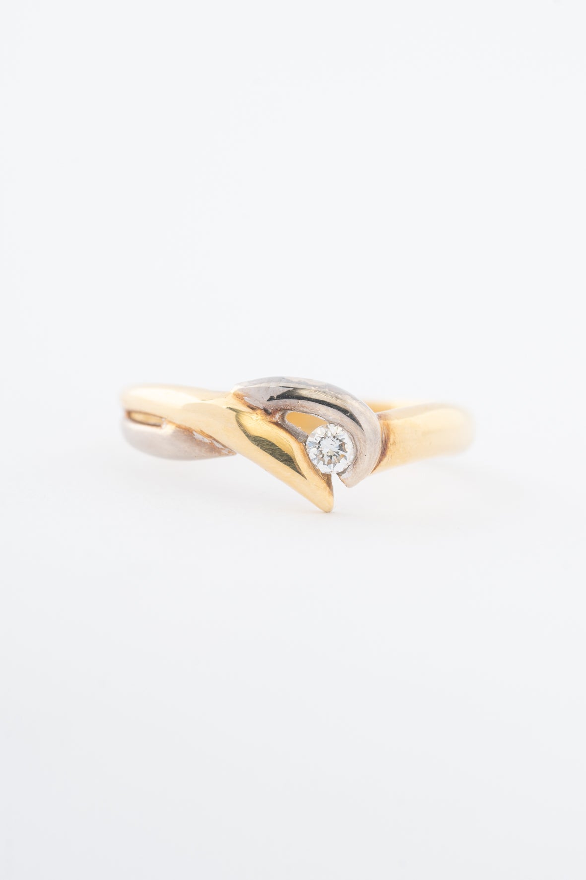 Witgouden/geelgouden ring met een briljant