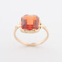 Geelgouden ring met syntretische padparaascha