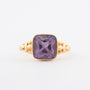 Geelgouden ring met synth. korund