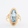 Geelgouden ring met een synth. spinel