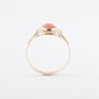 Geelgouden ring met bloedkoraal