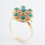 Geelgouden entourage ring met turkooizen