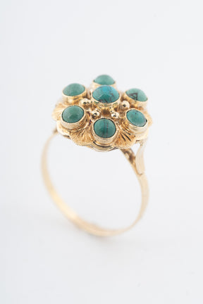 Geelgouden entourage ring met turkooizen