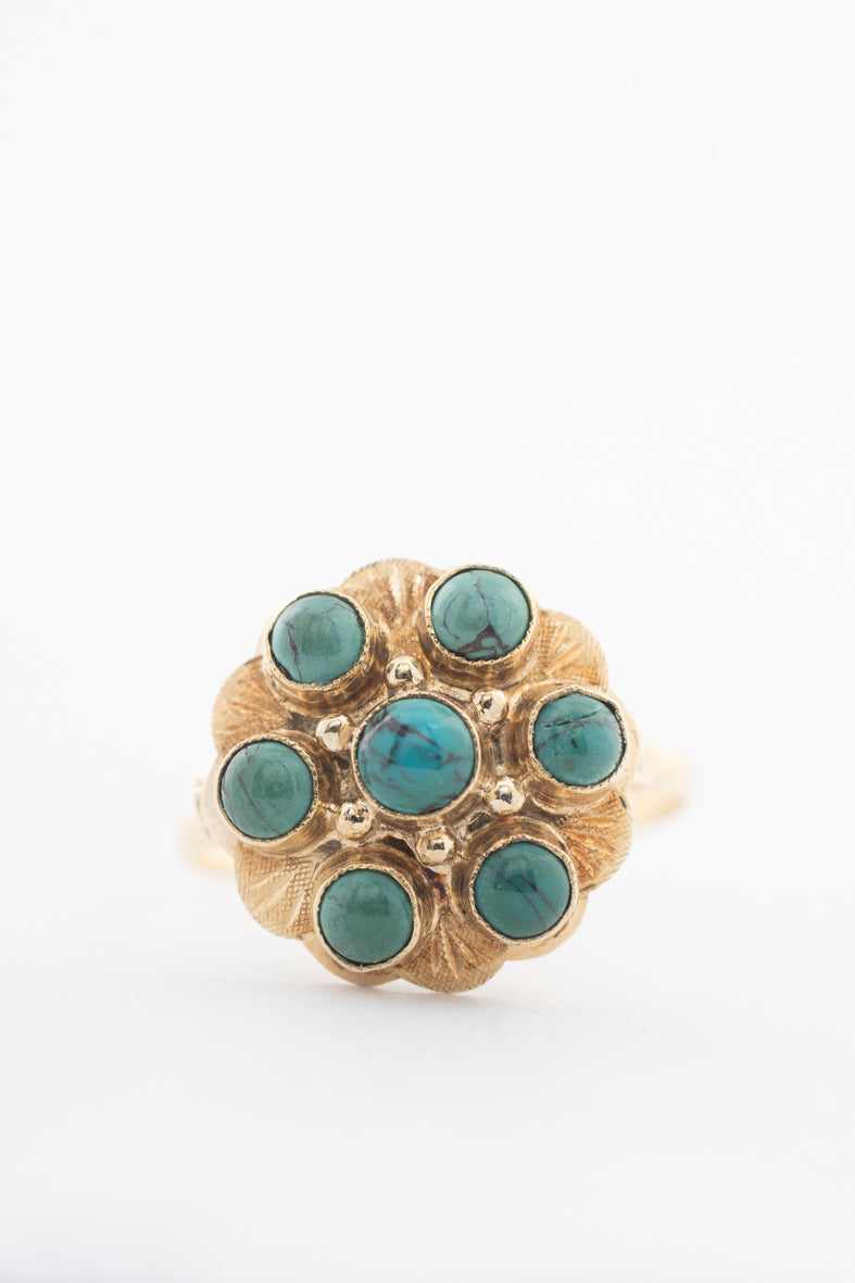 Geelgouden entourage ring met turkooizen