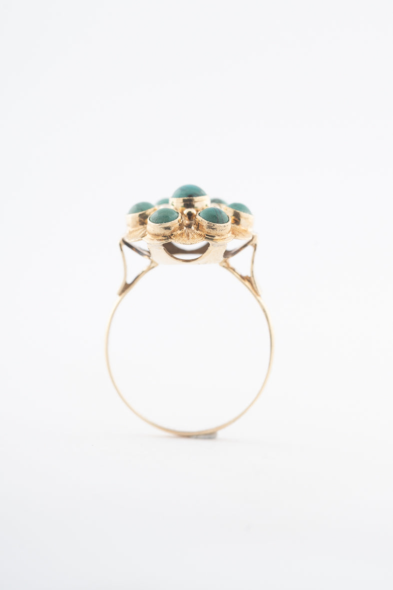 Geelgouden entourage ring met turkooizen