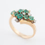 Geelgouden slag ring met smaragden en diamanten