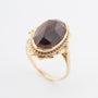 Yellow gold ring with garnet