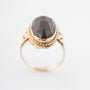 Yellow gold ring with garnet