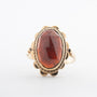 Yellow gold ring with garnet
