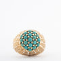 Geelgouden ring met turkooizen