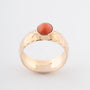 Geelgouden ring met een bloedkoraal