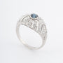 Platina bandring met blauwe spinel en diamanten