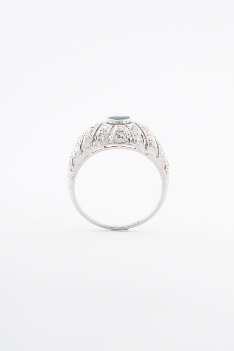 Platina bandring met blauwe spinel en diamanten