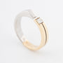 Wit (platina)/geelgouden ring met een diamant