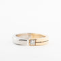 Wit (platina)/geelgouden ring met een diamant