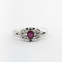 White gold ring with ruby and diamonds