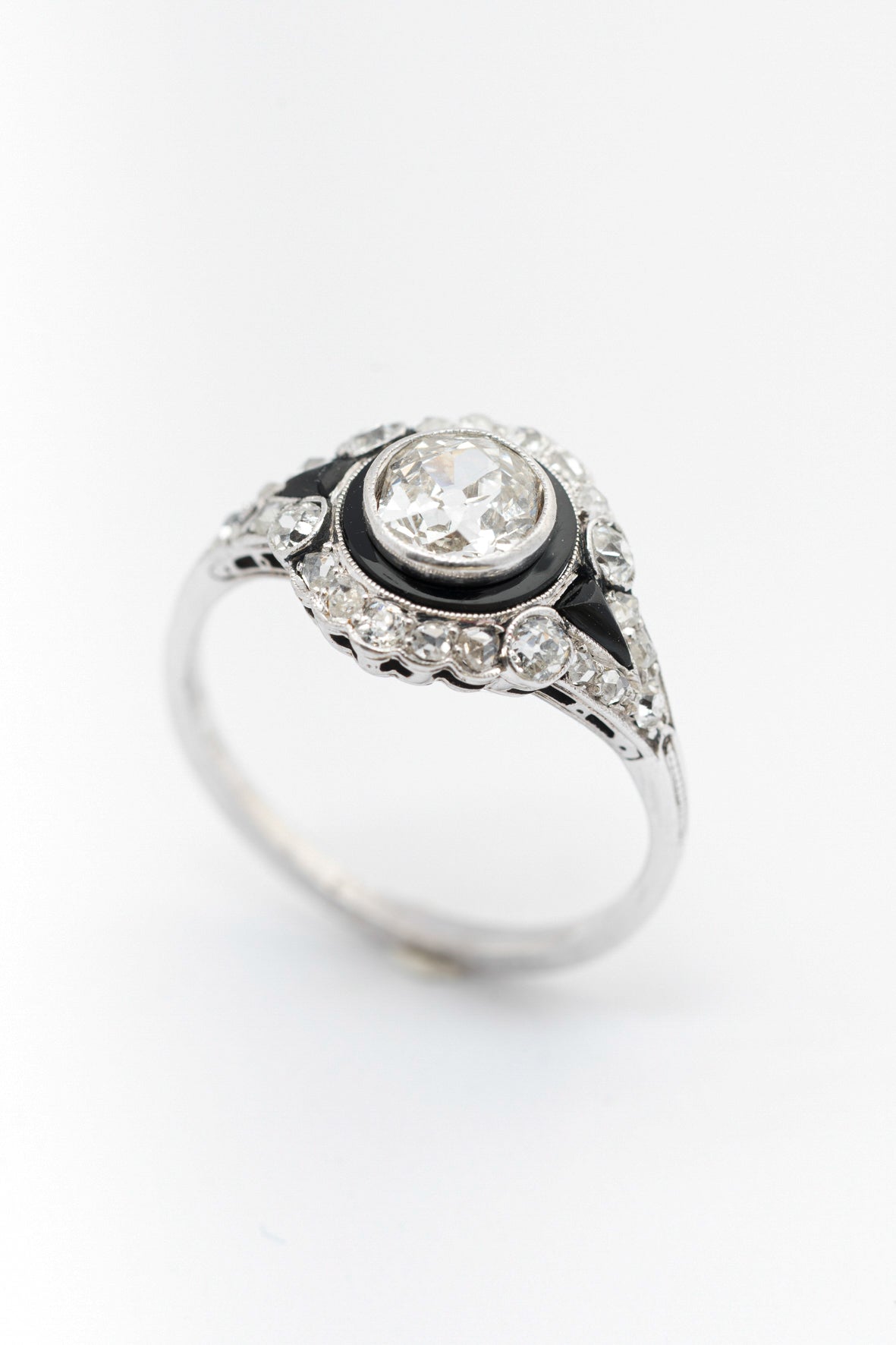 Antique white gold Art Deco ring with enamel, brilliant, and diamonds