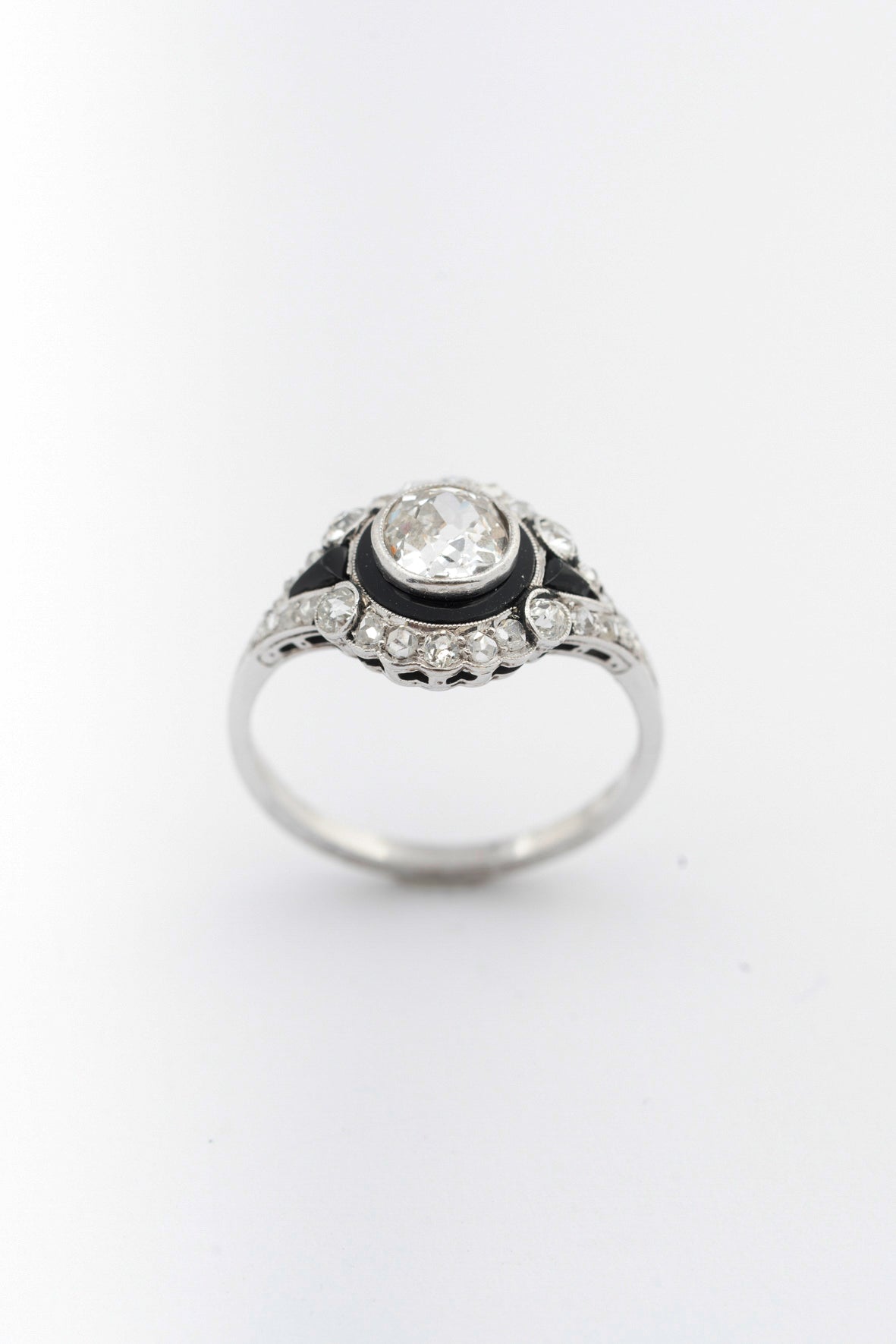 Antique white gold Art Deco ring with enamel, brilliant, and diamonds