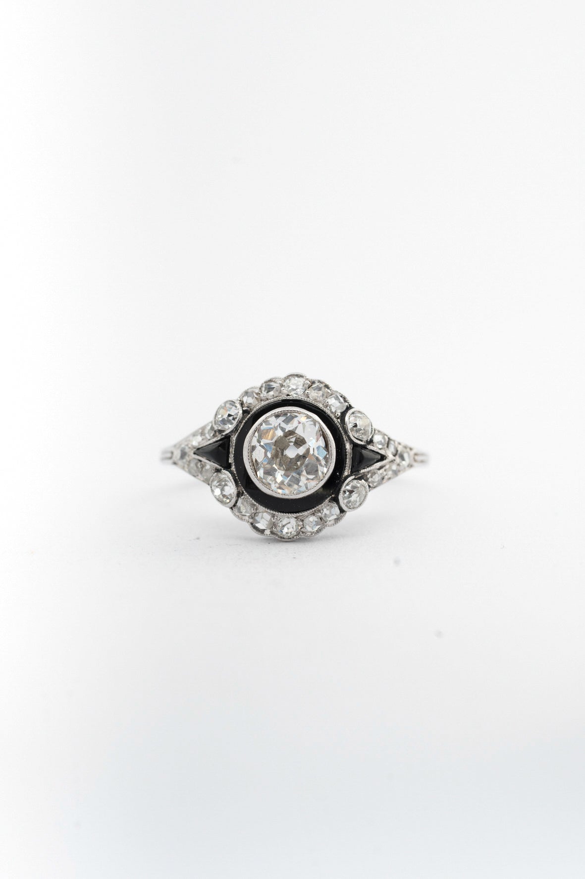 Antique white gold Art Deco ring with enamel, brilliant, and diamonds