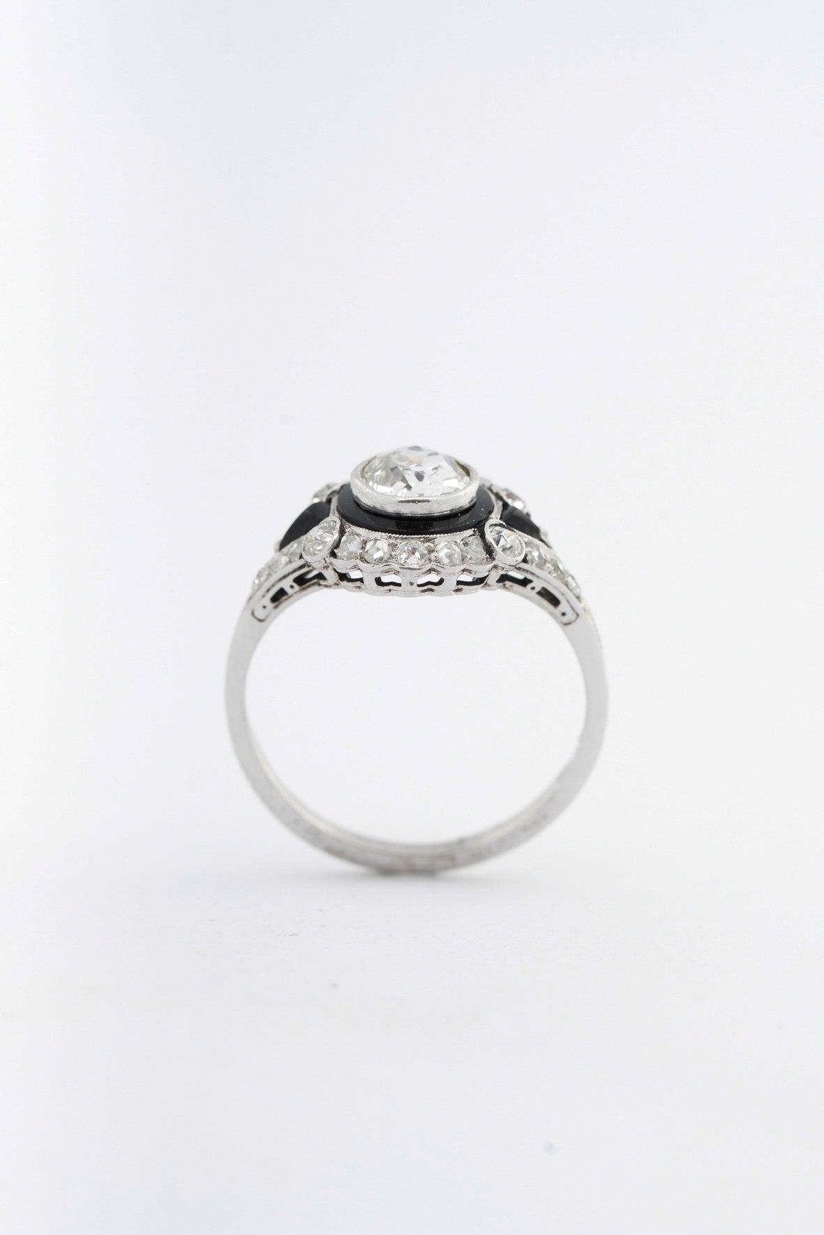 Antique white gold Art Deco ring with enamel, brilliant, and diamonds